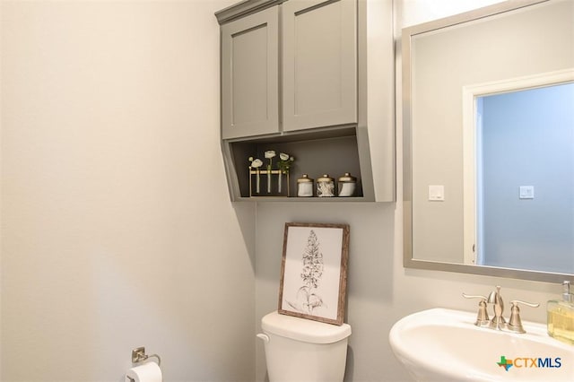 809 Reston Rd, Temple, TX 76502 - half bathroom with toilet and a sink
