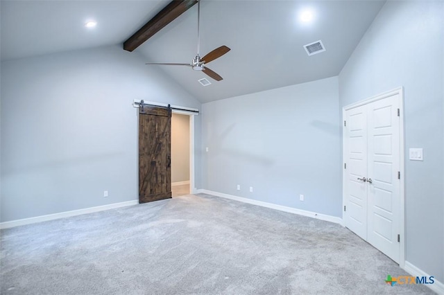 809 Reston Rd, Temple, TX 76502 - unfurnished bedroom with a barn door, carpet flooring, baseboards, a ceiling fan, and a closet