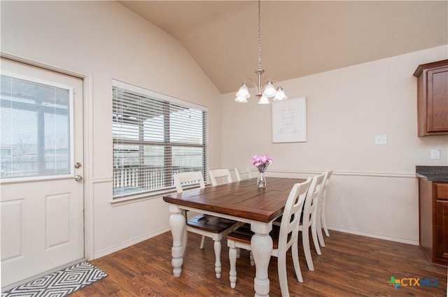 dining area featuring baseboards, lofted ceiling, a notable chandelier, and dark wood-style flooring