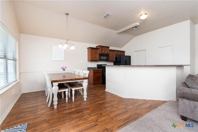 kitchen featuring visible vents, an inviting chandelier, lofted ceiling, black appliances, and dark wood-type flooring