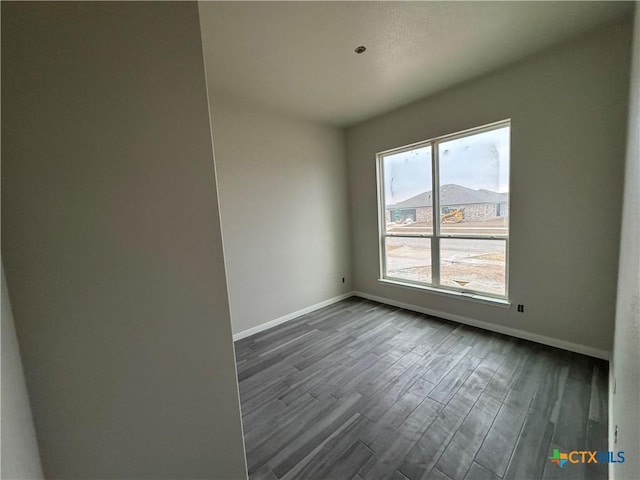 149 Atlas Ave, Killeen, TX 76542 - unfurnished room with dark wood-style floors and baseboards