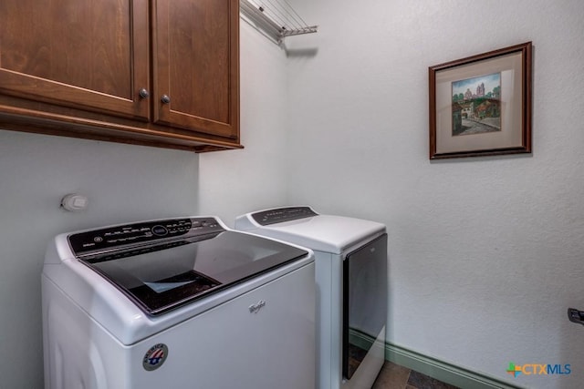 1215 Gruene Vintage, New Braunfels, TX 78130 - washroom with cabinet space and washer and dryer