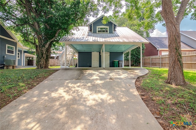 view of front of property with a carport