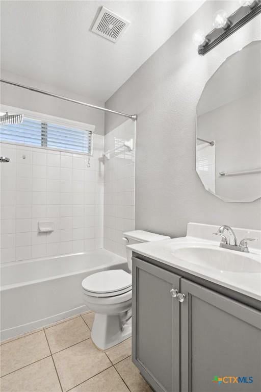 6902 Golden Oak Ln, Killeen, TX 76542 - bathroom featuring vanity, bathing tub / shower combination, toilet, and tile patterned floors
