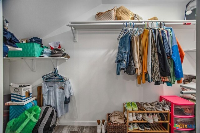 807 W Dallas Ave, Seadrift, TX 77983 - walk in closet with wood finished floors