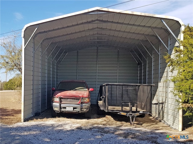 view of parking / parking lot featuring a carport