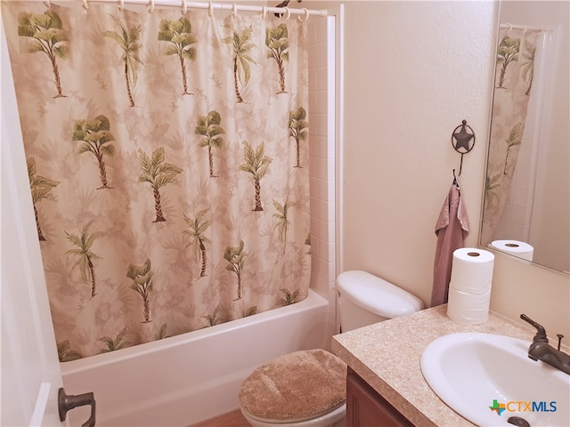 full bathroom featuring vanity, shower / bathtub combination with curtain, and toilet