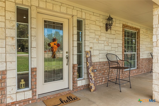 entrance to property with a porch