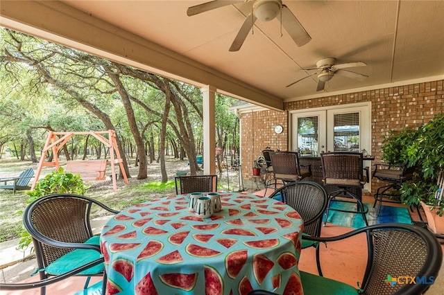 1199 Frederick Ln, Temple, TX 76502 - view of patio with outdoor dining area, french doors, and a ceiling fan