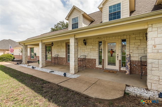 property entrance featuring covered porch