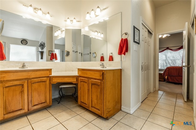 bathroom featuring vanity and tile patterned flooring