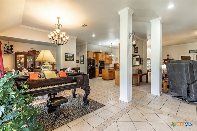 miscellaneous room with ornamental molding, an inviting chandelier, light tile patterned floors, and ornate columns