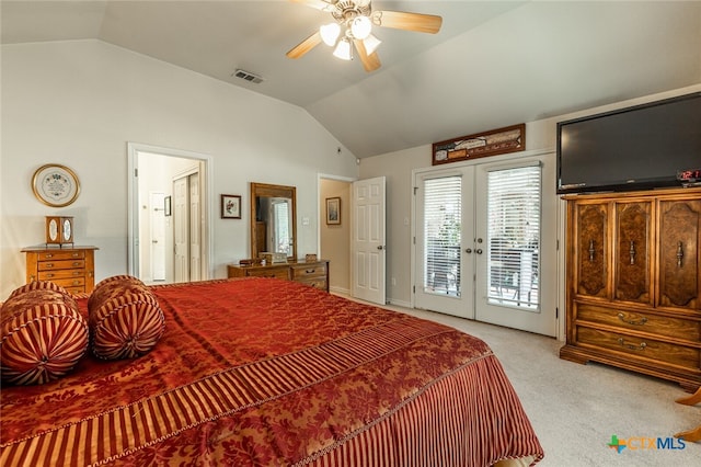 carpeted bedroom featuring access to exterior, french doors, lofted ceiling, and ceiling fan