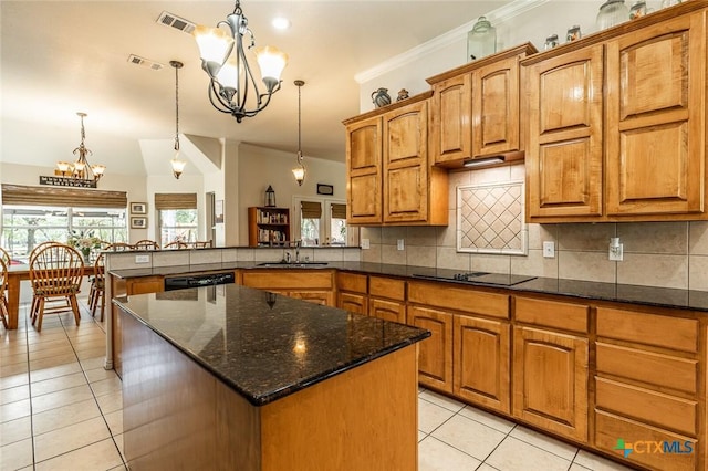 1199 Frederick Ln, Temple, TX 76502 - kitchen with a chandelier, a sink, light tile patterned floors, decorative backsplash, and ornamental molding