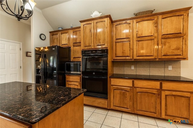 1199 Frederick Ln, Temple, TX 76502 - kitchen featuring black appliances, brown cabinets, light tile patterned flooring, decorative backsplash, and lofted ceiling
