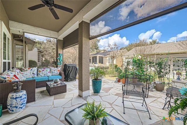 view of patio / terrace with ceiling fan, grilling area, and an outdoor hangout area