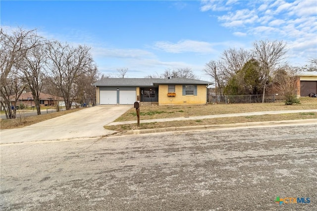 ranch-style house with a garage