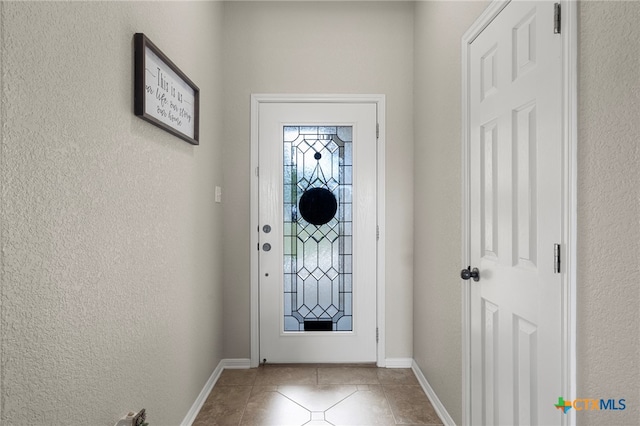 entryway with tile patterned flooring