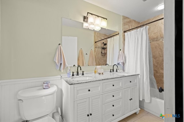 full bathroom with vanity, tile patterned floors, shower / bath combo, and toilet