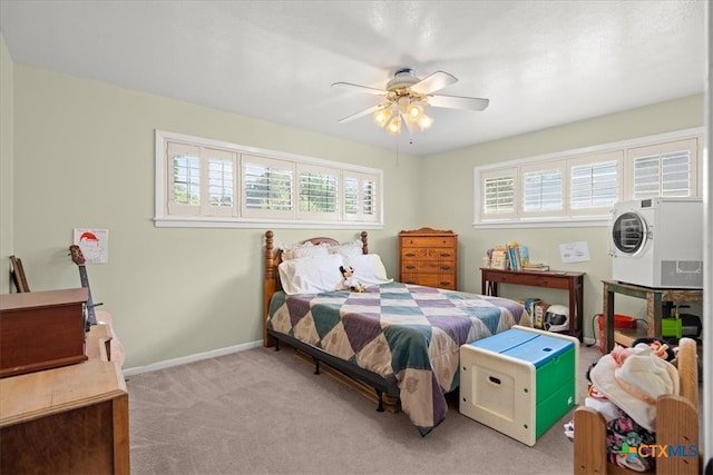 bedroom with light carpet, multiple windows, and ceiling fan