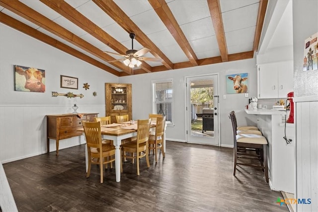 1415 Dove Ln, Seguin, TX 78155 - dining area with ceiling fan, dark wood-style flooring, and wainscoting