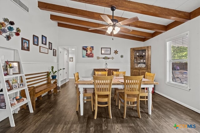 dining room with lofted ceiling with beams, dark wood-type flooring, and ceiling fan