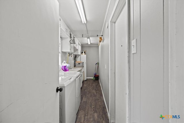 1415 Dove Ln, Seguin, TX 78155 - hallway with separate washer and dryer, dark wood-style flooring, and baseboards