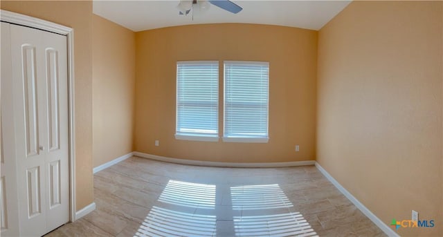 unfurnished room with ceiling fan