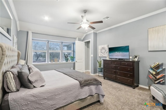 carpeted bedroom featuring crown molding and ceiling fan