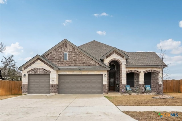 view of front of home with a garage