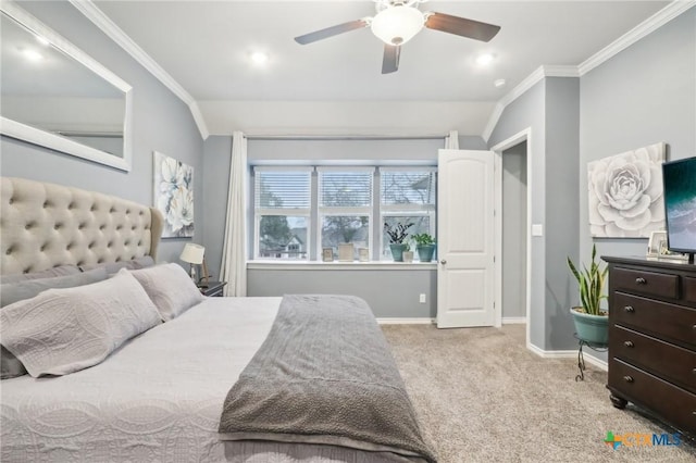 carpeted bedroom featuring crown molding and ceiling fan