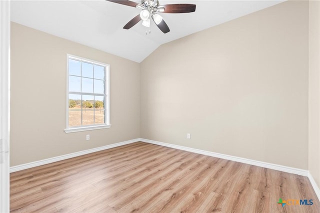 unfurnished room with ceiling fan, light hardwood / wood-style floors, and vaulted ceiling