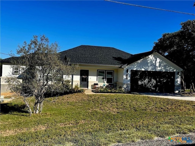 single story home with a garage, a front lawn, and a porch