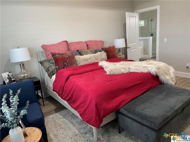 bedroom with wood-type flooring