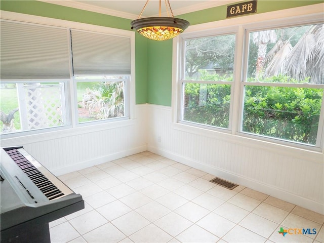 unfurnished sunroom with visible vents