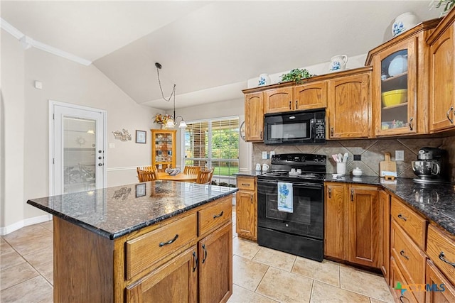 1907 Merlin Dr, Harker Heights, TX 76548 - kitchen with black appliances, vaulted ceiling, light tile patterned flooring, decorative backsplash, and brown cabinets