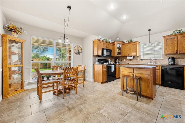 1907 Merlin Dr, Harker Heights, TX 76548 - kitchen featuring black appliances, tasteful backsplash, lofted ceiling, a sink, and glass insert cabinets