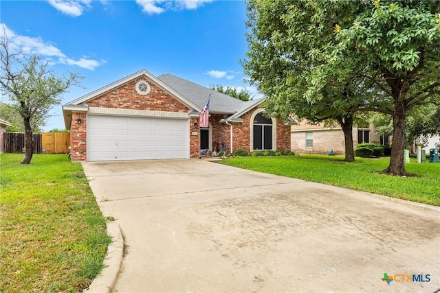 1907 Merlin Dr, Harker Heights, TX 76548 - view of front of house featuring brick siding, driveway, and an attached garage