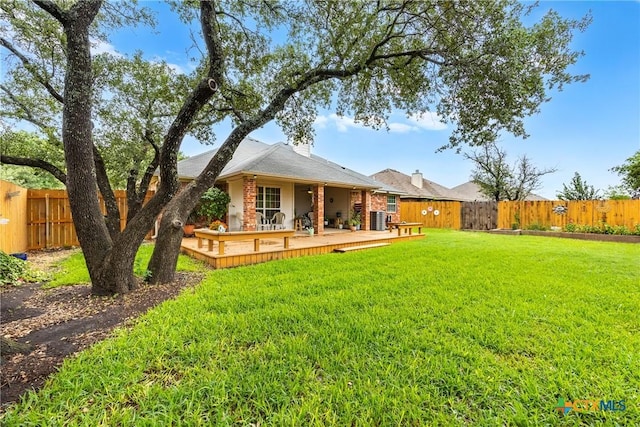 1907 Merlin Dr, Harker Heights, TX 76548 - rear view of property with central AC unit, a wooden deck, and a chimney