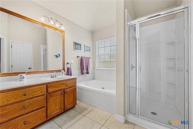 1907 Merlin Dr, Harker Heights, TX 76548 - full bathroom featuring vanity, a shower stall, tile patterned floors, and a garden tub