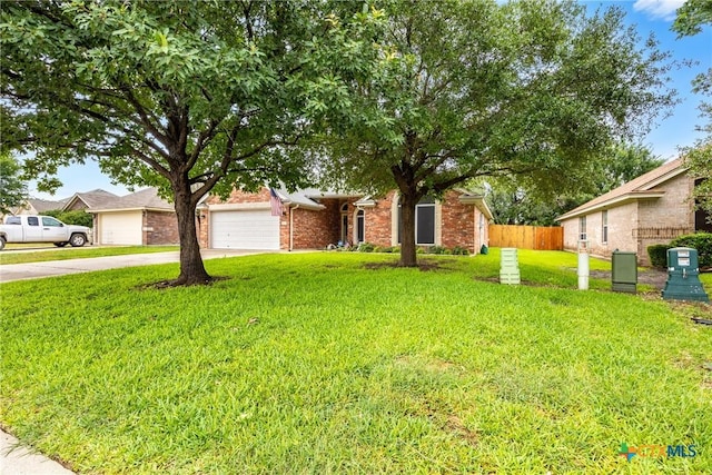 1907 Merlin Dr, Harker Heights, TX 76548 - view of property hidden behind natural elements with concrete driveway and brick siding