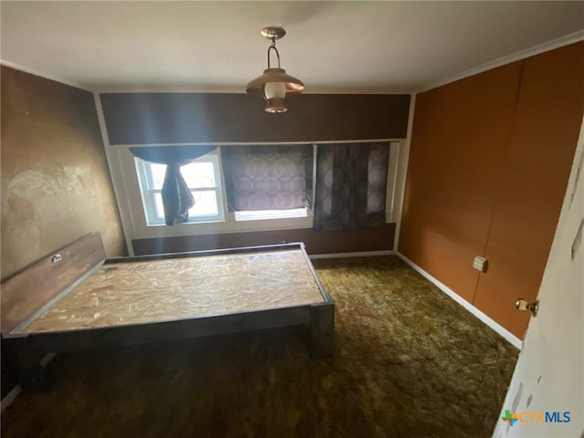 unfurnished dining area featuring carpet flooring