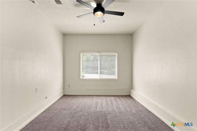 809 S 13th St, Copperas Cove, TX 76522 - spare room with carpet floors, a ceiling fan, and baseboards