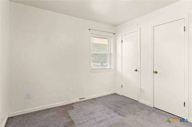 809 S 13th St, Copperas Cove, TX 76522 - unfurnished bedroom featuring carpet flooring and baseboards