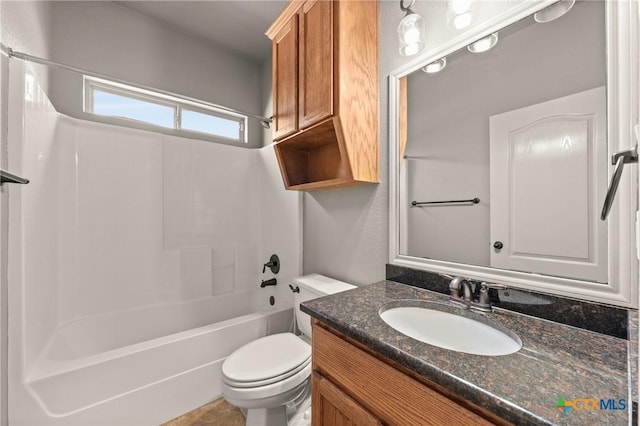 full bathroom with vanity, bathtub / shower combination, and toilet