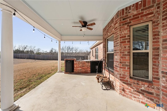 view of patio / terrace featuring ceiling fan