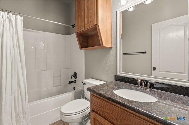 full bathroom featuring shower / tub combo with curtain, vanity, and toilet