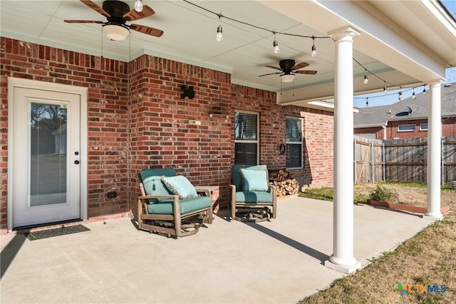 view of patio with ceiling fan