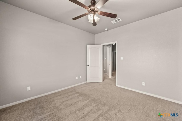 unfurnished bedroom with light colored carpet and ceiling fan