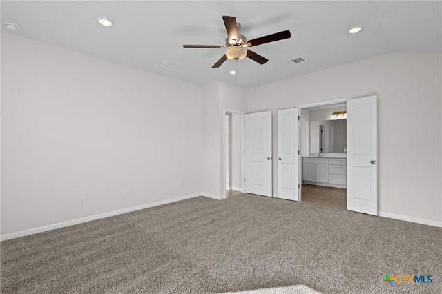 unfurnished bedroom featuring ceiling fan and carpet flooring